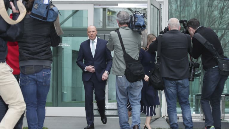 Peter Dutton on the way to a press conference on Thursday.