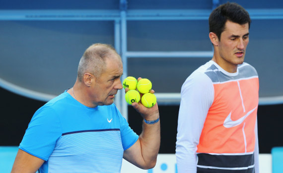 Tomic with his father and former coach, John.