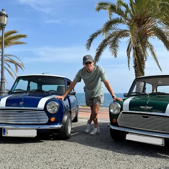 With his Mini collection.