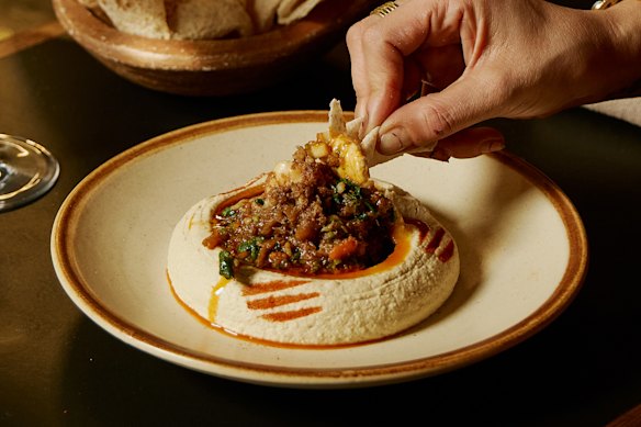 Hummus topped with Fraser Isle spanner crab and Mooloolaba prawns at Tom Sarafian’s debut restaurant, Zareh.