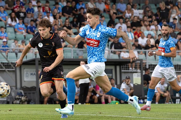 Damian Tsekenis on the ball for Marconi.