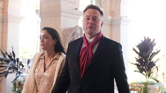 Elon Musk and Shivon Zilis arrive at Donald Trump’s Mar-a-Lago Club earlier this year.