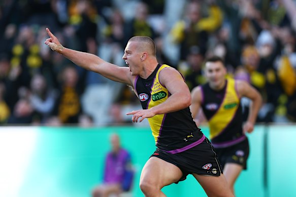 Footy with feeling: Richmond’s Sam Lalor after kicking the sealer.