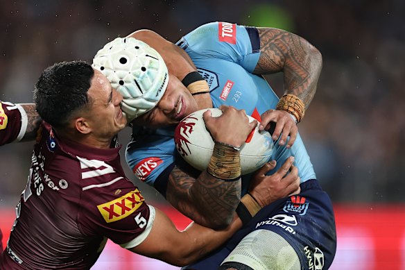 Brian To’o is trapped by Valentine Holmes.