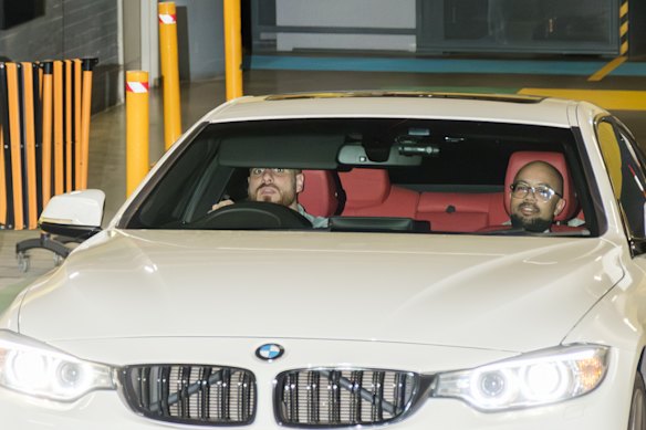 Ibrahim Helmy and his lawyer leave the ICAC premises on Friday.