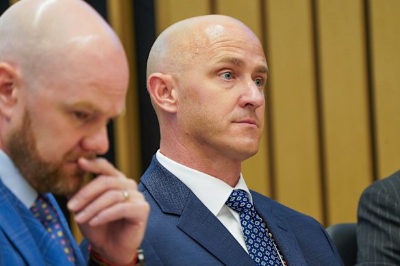 Joseph Emerson (right) appears at a previous court hearing. 