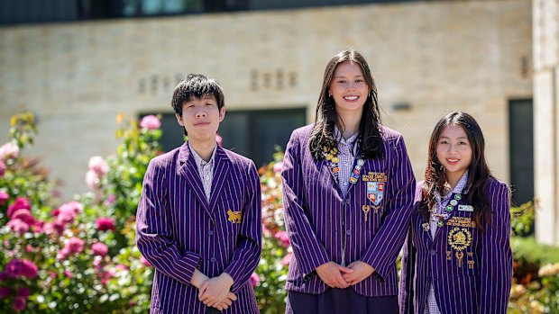 Wesley College students Sunny Wong, Kirwan Schoenborn and Yanxi ( Sissi ) Li receive their IB scores.