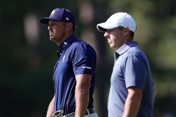 Bryson DeChambeau and Rory McIlroy during the last round of the 2025 Masters.