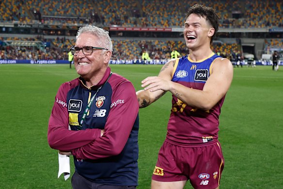 Brisbane Lions coach Chris Fagan and star forward Cam Rayner were all smiles on Saturday night.