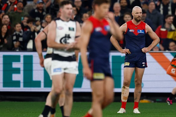 A dejected Max Gawn (right).