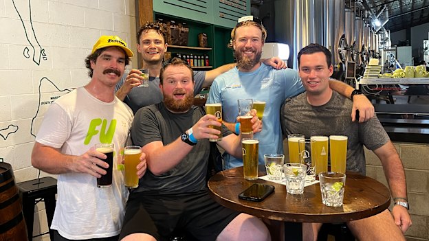 Runners get a reprieve from the rain at the fourth bar on the trail, Green Beacon Brewing Co.