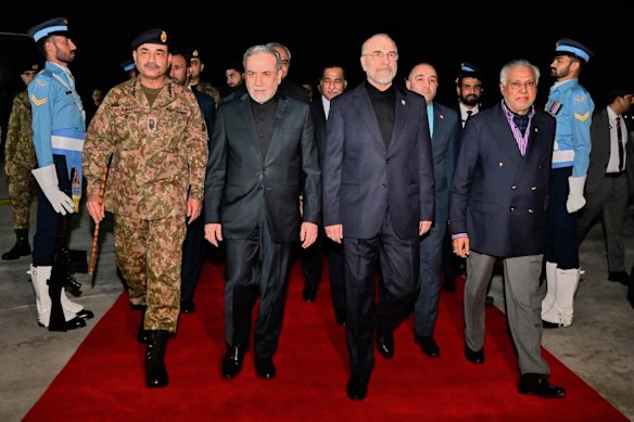 The Iranian delegation was led by parliamentary Speaker Mohammed Bagher Ghalibaf (centre right) and Foreign Minister Abbas Araghchi (centre left).