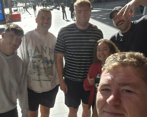 British and Irish Lions fan Rebecca Grice, in a selfie taken on July 5 with five Lions players she ran into in George Street, Sydney. (Clockwise from left) Dan Sheehan, Tadhg Beirne, Ollie Chessum, Jack Conan, and Tadhg Furlong holding the camera.