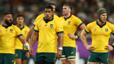 Wallabies players react to their World Cup quarter-final loss to England.