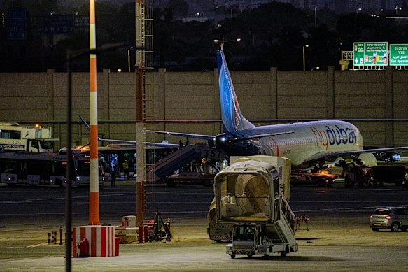 A plane carrying passengers from an earlier Flydubai flight that was diverted to Saudi Arabia arrives at Ben Gurion Airport.