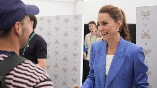 Kate sold tickets to tennis fans and posed for photos with those in the queue.