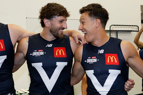 Marcus Bontempelli and Hugh McCluggage celebrate Victoria’s win.