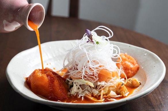 The mulhoe’s spicy broth is poured over piles of shaved ice.