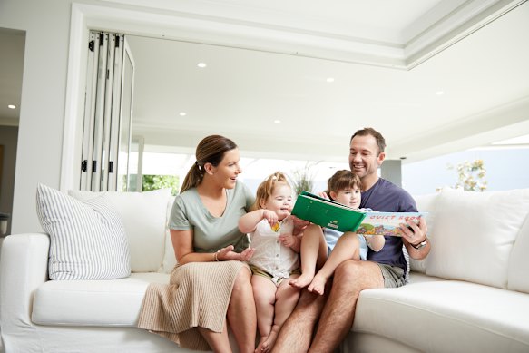 Jess Whatman with husband Clint  and their two girls, Jovi and Ella.
