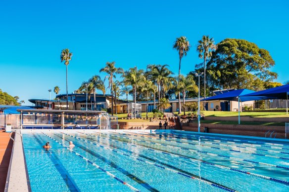 Engadine Leisure Centre in Sydney’s southern suburbs features several outdoor pools and a grassy hill.