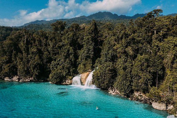Popular snorkelling spot, Kiti-Kiti Waterfall in West Papua.