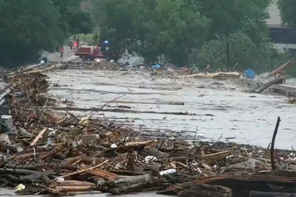 Water rises from severe flooding along the Guadalupe River in Kerr County, Texas on Friday.