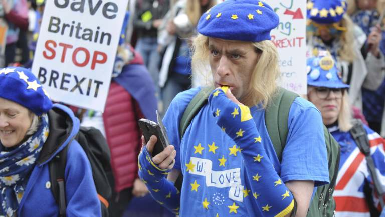 Demonstrators protest against Brexit as the governing Conservative Party start their annual four-day party conference on Sunday.