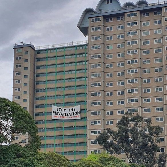 Protest action at one of the first towers to be demolished, at 12 Holland Court on the Flemington estate, on October 31.
