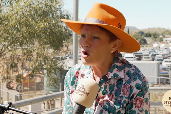 Pauline Hanson wearing what appears to be a custom-made hat made by Gina Rinehart’s Kidman Clothing company.