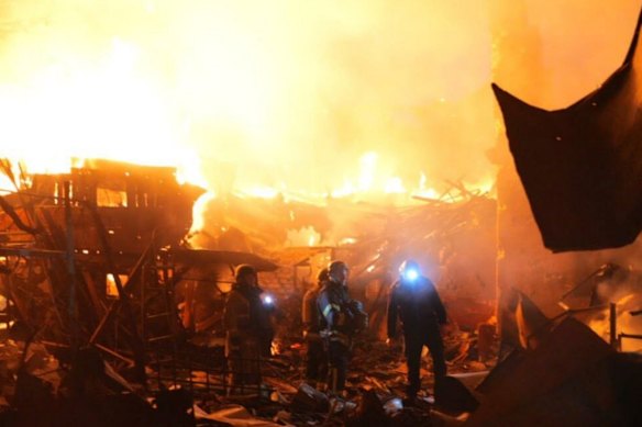 Rescuers work on a site of a house destroyed by a Russian strike in Zaporizhzhia. This image was provided by the regional military administration.