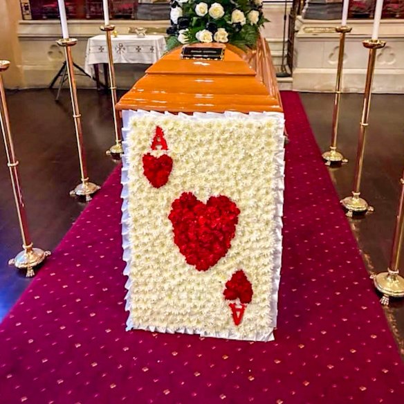 Charlie’s Red Aces casket.