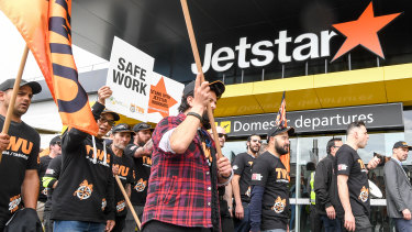 Jetstar workers on strike at Melbourne airport on Friday.