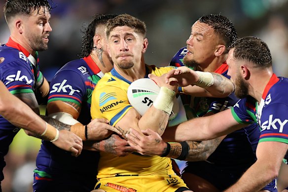  Former Eels star Zac Lomax (centre) and Parramatta are heading to court.