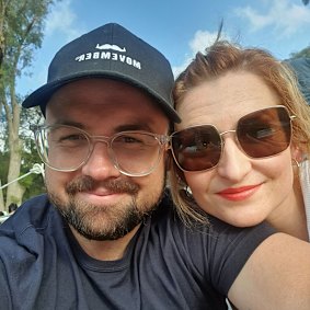 Anthony Woods with his wife, Emily.