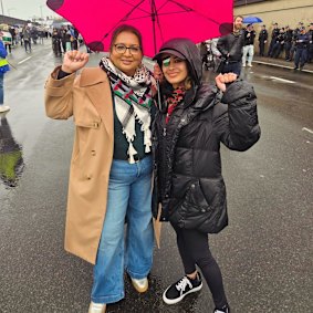 Greens senator Mehreen Faruqi with former Greens candidate for Grayndler Hannah Thomas, who was injured by police in June at another protest, at the March for Humanity on Sunday.