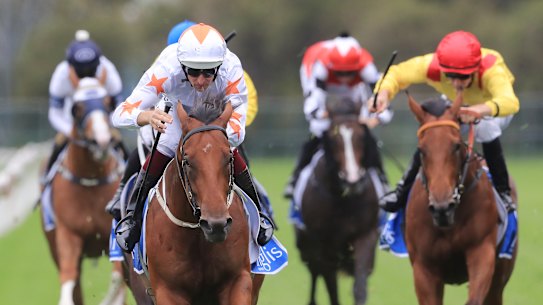 Phoenix Thoroughbreds’ horse Farnan (white cap) wins the 2020 Golden Slipper.