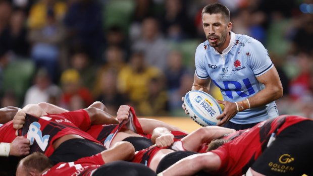 Jake Gordon puts the ball into the scrum for the Waratahs in 2024.