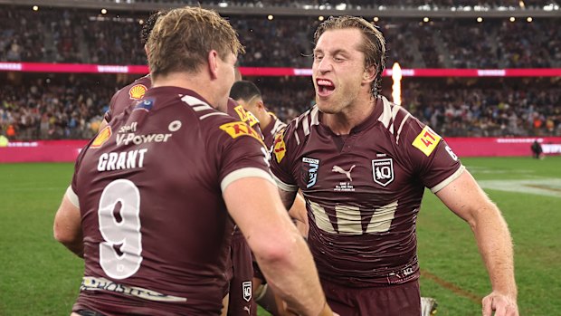 Cameron Munster and Harry Grant celebrate victory in Origin II in Perth.