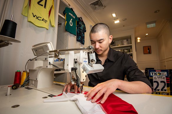 Unwanted FC garment technician Romon Yang working on a sewing machine in the company’s Sydney concept store.