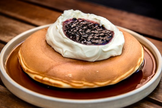Theeca serves one giant pancake.