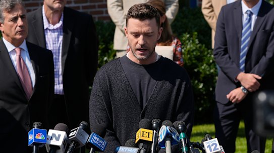 Justin Timberlake speaks to the press after a court hearing.