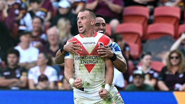 Dragons fullback Clint Gutherson celebrates a try.
