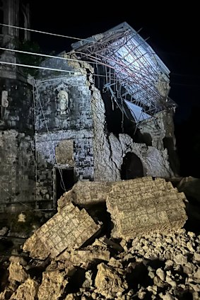 Damage outside the Archdiocesan Shrine of Santa Rosa de Lima in Cebu City on Tuesday, after a strong offshore earthquake with a preliminary magnitude of 6.9 shook the central Philippines. 