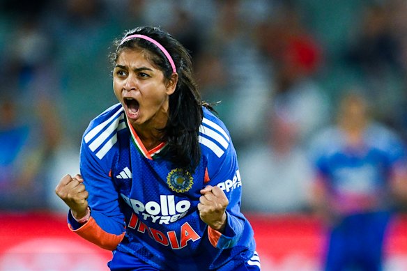India’s Shreyanka Patil is pumped up after claiming the wicket of Annabel Sutherland.