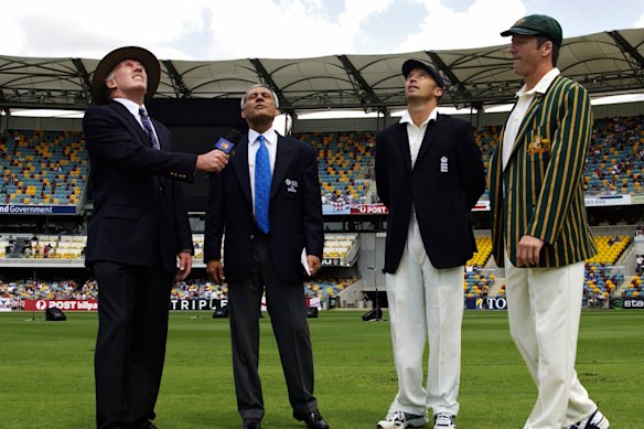 Nasser Hussain of England and Steve Waugh of Australia toss the coin during day one of the first Ashes Test between Australia and England held on November 7, 2002 at the Gabba. 