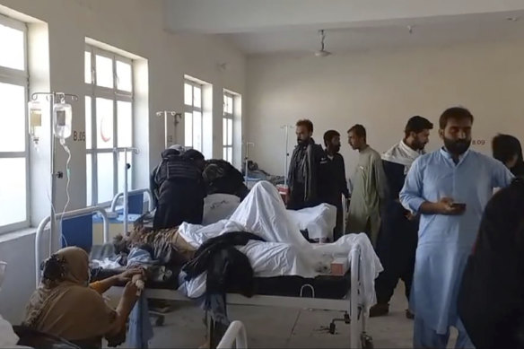 Injured victims of bomb explosion are treated at a hospital, in Mastung near Quetta, Pakistan, on Friday.
