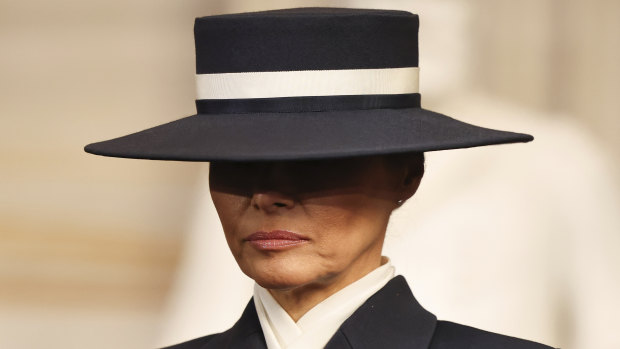 First lady Melania Trump bows her head during the inauguration ceremony.