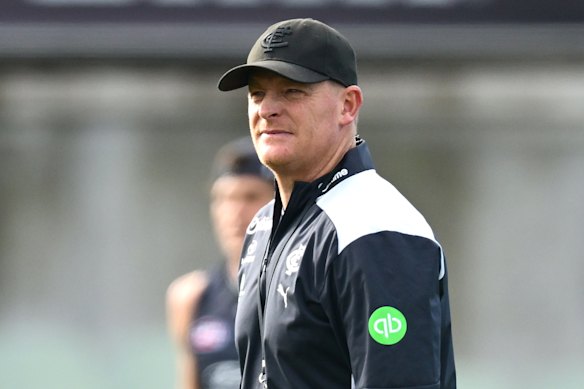 Carlton coach Michael Voss watches on during a training session.
