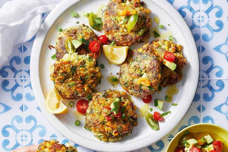 Zucchini and corn fritters with salsa.