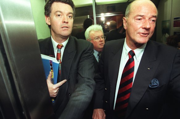 The Sydney Olympics Organising Committee’s Michael Knight, Graham Richardson and Kevan Gosper leaving a press conference in 1999 after it was revealed that few prime Olympics  tickets were made available to the Australian public. 